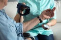 Nurse measuring blood pressure Royalty Free Stock Photo