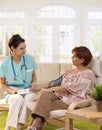 Nurse measuring blood pressure Royalty Free Stock Photo