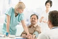 Nurse measuring patient blood pressure