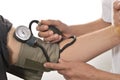 Nurse monitoring blood pressure Royalty Free Stock Photo