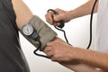 Nurse monitoring blood pressure Royalty Free Stock Photo