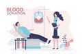 Nurse monitors transfusion of blood into plastic bag. Donor donates blood voluntarily to donation center Royalty Free Stock Photo
