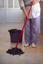 A nurse mops the floor in a hospital Royalty Free Stock Photo