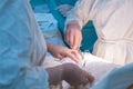 A nurse, in the operating room, gives tools to a pediatric surgeon during an operation for pediatric urology. Close-up Royalty Free Stock Photo