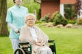 In the garden of modern senior home with daily care