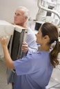 Nurse With Patient Having An X-Ray Royalty Free Stock Photo