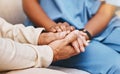 Nurse, patient and holding hands in nursing home for healthcare, empathy and support in depression, anxiety and Royalty Free Stock Photo