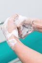 Nurse perform surgical hand washing, Preparation to the operating room. Closed-up of the hands.