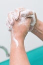 Nurse perform surgical hand washing, Preparation to the operating room. Closed-up of the hands. Royalty Free Stock Photo