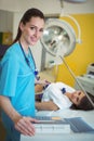 Nurse performing an electrocardiogram test on the patient Royalty Free Stock Photo