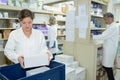 Nurse and pharmacists working in pharmacy Royalty Free Stock Photo