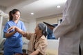 Nurse physiotherapy with elderly patient while stretch hands in hospital, senior exercise and workout with physiotherapist.