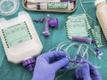 Nurse placed adapter in equipment probe of enteral nutrition, palliative care in hospital, conceptual image