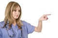 Nurse pointing isolated on white