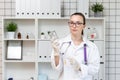 The nurse prepares a dropper with a solution of medicine. Royalty Free Stock Photo