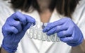 Nurse prepares medication in ampoules for oxygen mask in a hospital