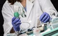 Nurse prepares oxygen mask in hospital