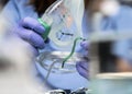 Nurse prepares oxygen mask in hospital