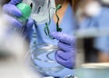 Nurse prepares oxygen mask in hospital
