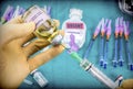Nurse preparing hospital medication, Extracting with syringe parenteral solution , conceptual image