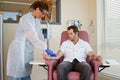 Nurse preparing patient for chemotherapy Royalty Free Stock Photo