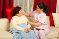 Nurse put a pillow to senior woman