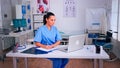 Nurse receving health results of patients on laptop Royalty Free Stock Photo