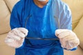 Nurse removing glasses at the end of the shift Royalty Free Stock Photo