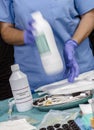 Nurse shaking enteral Nutrition bottle in a hospital, Palliative Care Royalty Free Stock Photo