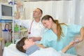 Nurse showing kindness to female patient