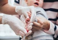 Nurse taking a little child blood sample. Medical equipment.