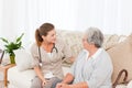 Nurse talking with her patient