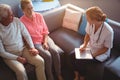 Nurse talking to senior couple Royalty Free Stock Photo