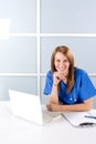 Nurse thinking in a modern office Royalty Free Stock Photo