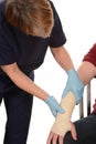 Nurse treating injured arm