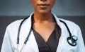 Nurse in uniform healthcare concept. Black doctor with a stethoscope in a medical coat. Half torso front position without head. Royalty Free Stock Photo