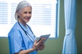 Nurse using digital tablet