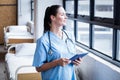 Nurse using her tablet pc Royalty Free Stock Photo