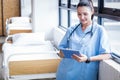 Nurse using her tablet pc Royalty Free Stock Photo