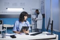 Nurse using smart tablet for checkups Royalty Free Stock Photo