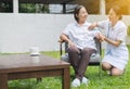 Nurse using stethoscope to senior patient woman,Nursing home care concept Royalty Free Stock Photo