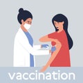 A nurse vaccinates a woman