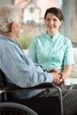 Nurse visiting disabled patient Royalty Free Stock Photo