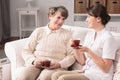 Nurse visiting patient at home