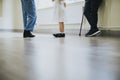 Nurse walking a patient down the hallway Royalty Free Stock Photo