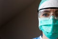 A nurse wearing a facial mask. Protection and hard working nurses concept