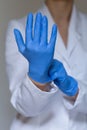 Nurse wearing protective gloves