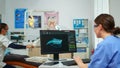 Nurse working at digital dental fingerprint of patient