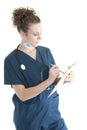 Nurse writing on a clipboard