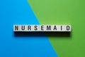 Nursemaid - word concept on cubes Royalty Free Stock Photo